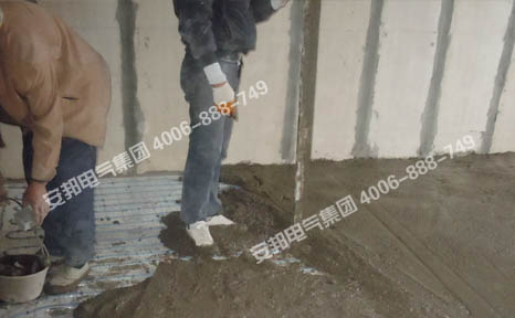 電地暖鋪設(shè)完成后的混凝土回填